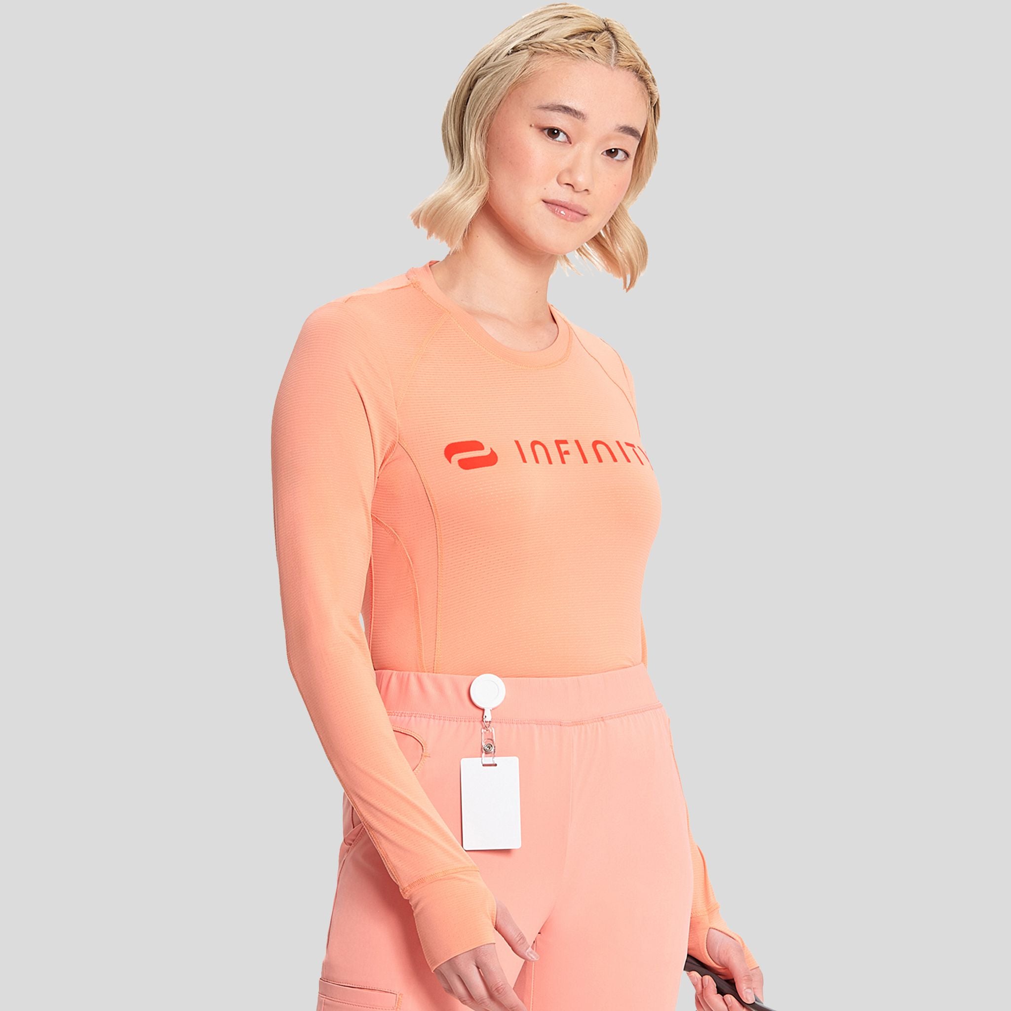 IN_INFINITY_GNR8_LOGOPERFORMANCEUNDERSCRUB_641_ELECTRICCORAL_RIGHT